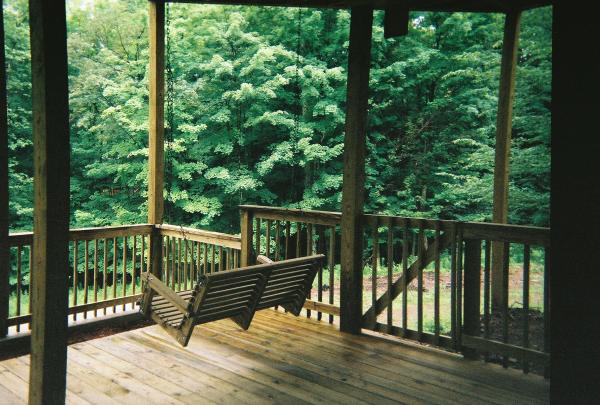 Lower lvl: Deck with porch swings and chairs