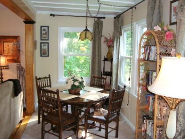 Sunroom off the Living Room with Dining Table 