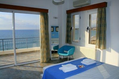 Bedroom with view of Poseidon Beach