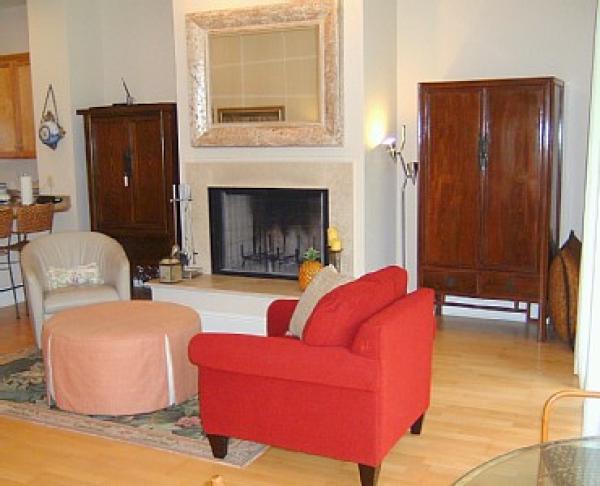 Living Room and Fireplace with Kitchen to Left