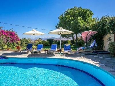 Agapi Villa pool with sun loungers