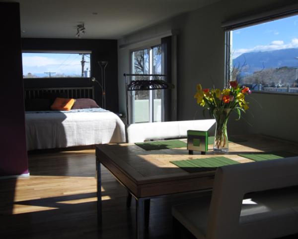 Master Bedroom with mountain views & private deck
