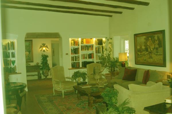 Living Room WIth Fireplace & Front Entry Hall View