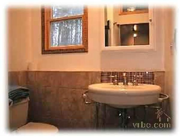 Bathroom w/marble tile shower