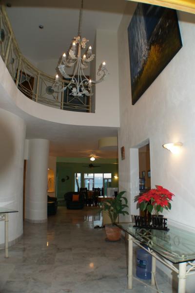 Dramatic 2 Story Foyer with Artwork