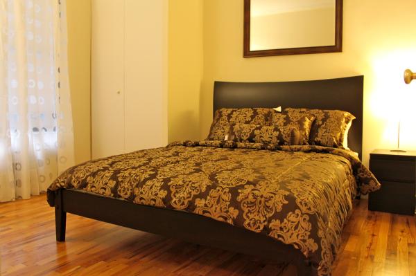 Bedroom has a Solid Mahogany Queen Size Bed 10E