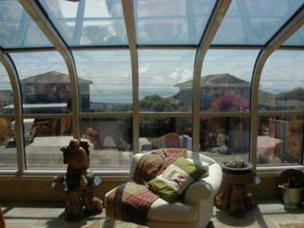 Sunroom overlooking 1 home to Ocean & Monterey Bay