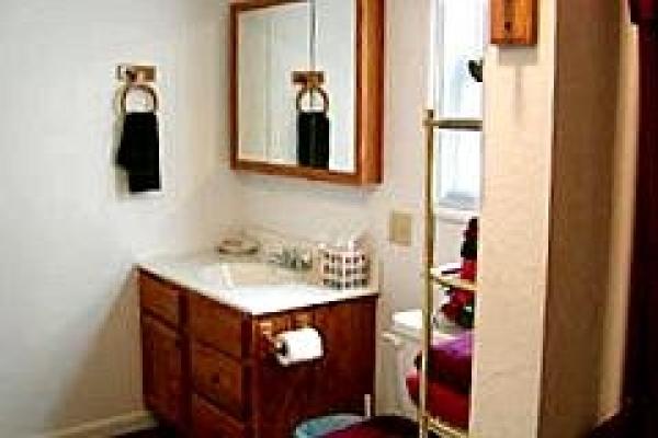 Large bathroom with shower and Laundry area