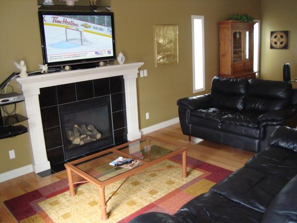 Living Room,50 inch TV, view of yard hot tub Wi-Fi