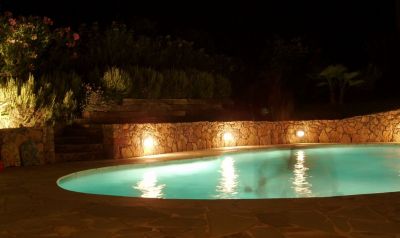 Grasse villa pool at nighttime 