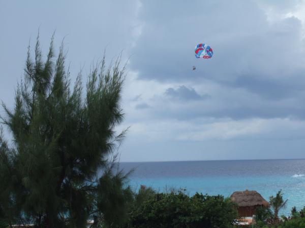 View Sky Divers from the rooftop terrace or beach!