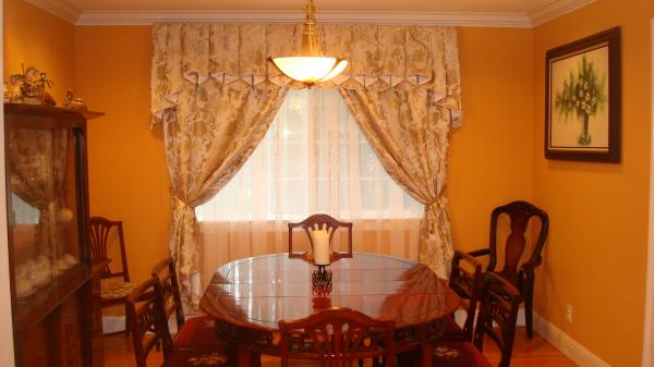 Formal Dining Room With Mahogany furniture