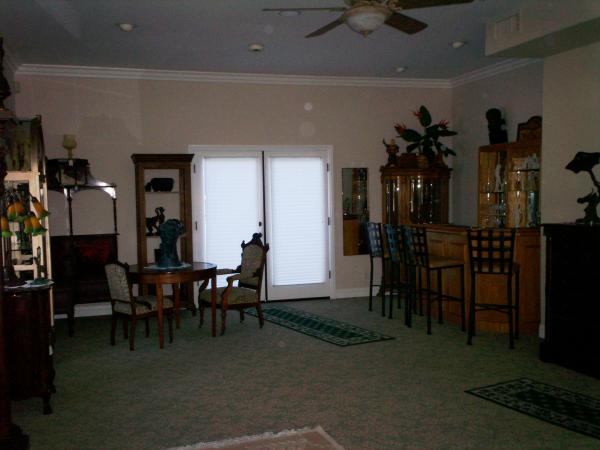 Partial view of living room from front door area