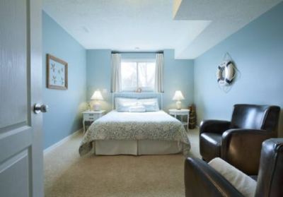 The Shoreline Room: queen bed, sitting area, mini-bar robes and slippers, sleeps 2