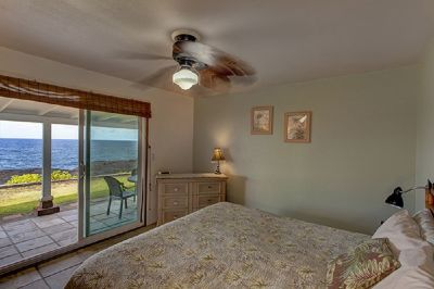 Master bedroom with sliders to lanai, ocean view
