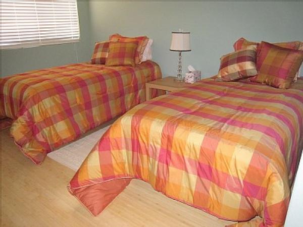 Comfortable Twin Beds in this Bedroom