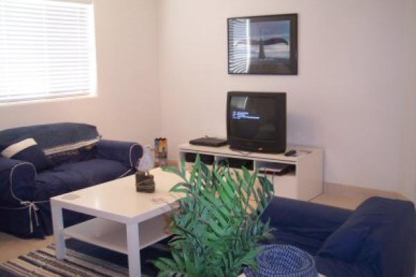 Living room area with Satillete TV, CD, VCR & DVD