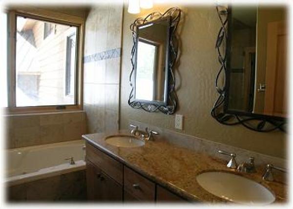 The master bathroom with deep jetted tub 