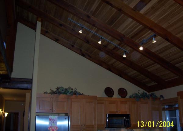 Heavy beam and cedar ceiling extends to 19 feet