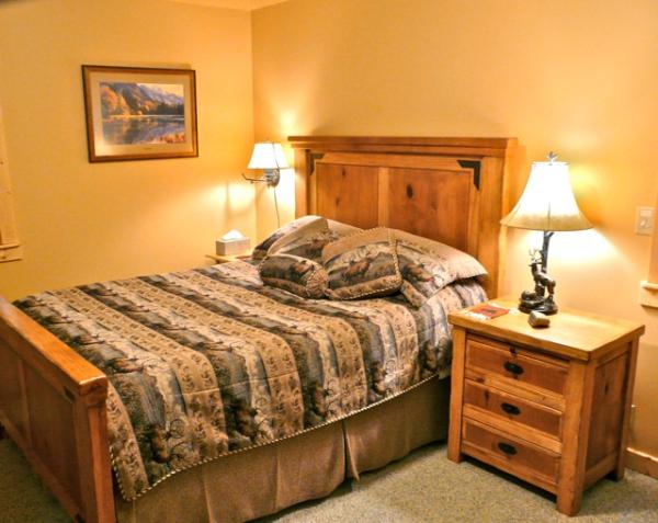 Master bedroom with nice cabin bedding
