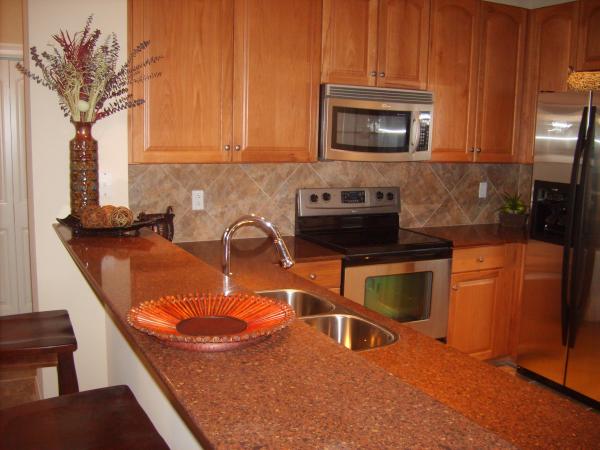 Kitchen with Granite counter-tops, stainless steel