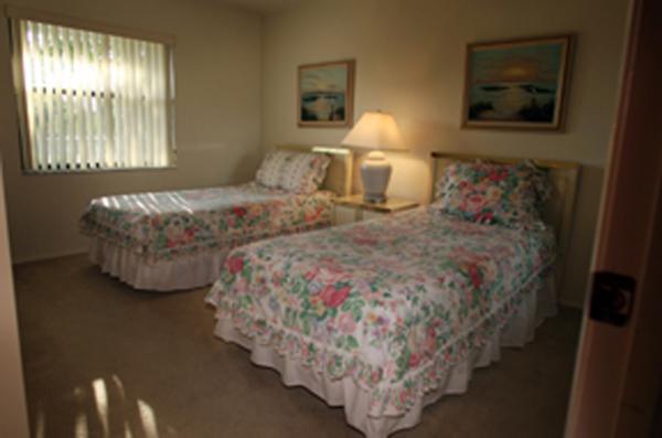 THE SECOND BEDROOM FEATURES TWIN BEDS.