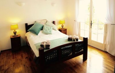 Our downstairs ensuite double room that spills out onto the poolside terrace