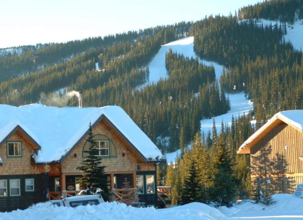 Lodge with Apex ski runs in background