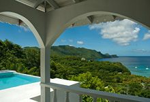 Ocean view villa with pool and pillared veranda