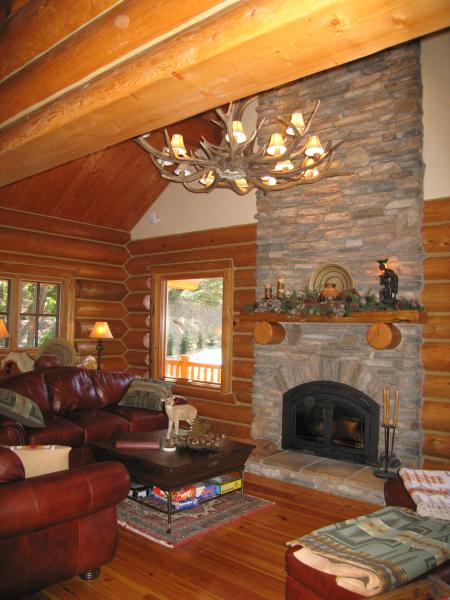 Massive log beam ceilings & rock fireplace