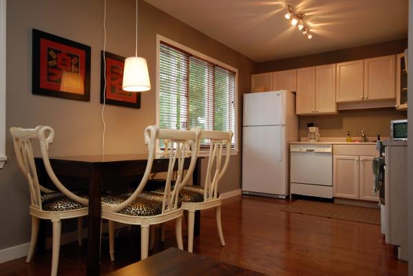 large well equipped kitchen and dining area