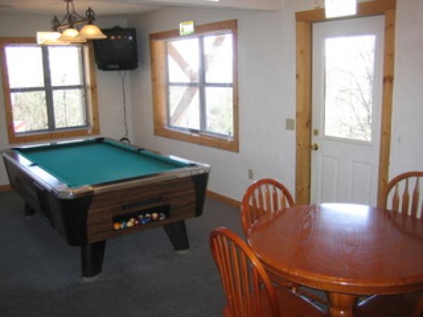 Game room with pool table and air hockey