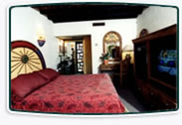 Queen bedroom with mexican furnishings