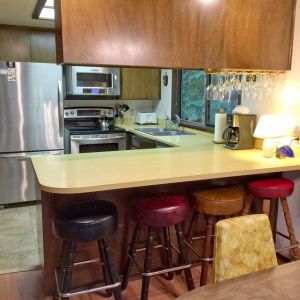 Kitchen breakfast bar with stools