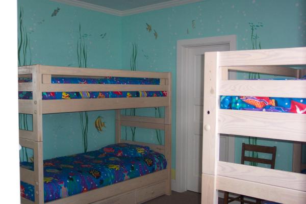 kid's room is a fun aquarium and sleeps 6