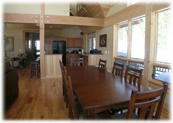 The dining table is located just off the kitchen 