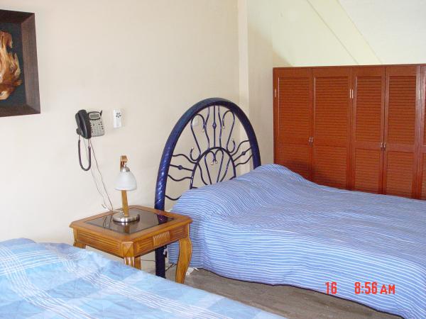 Bedroom with king size bed and double bed