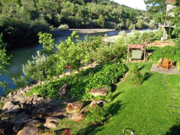 Lawn and riverfront patio 