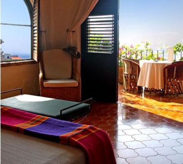 #4 Bedroom opening onto balcony overlooking beach