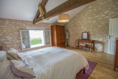 Spacious bedroom with view of gardens