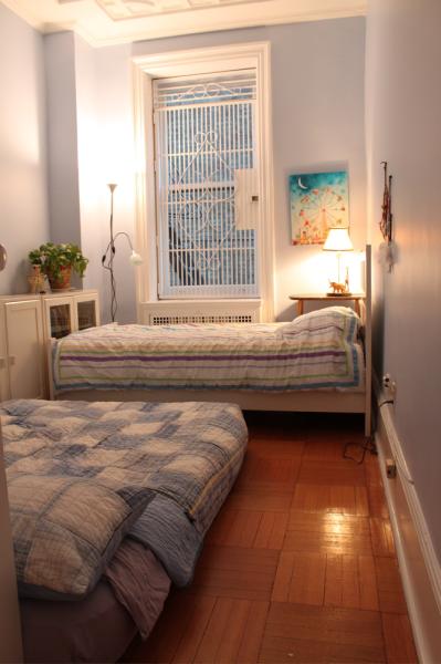 Blue Bedroom with Air Mattress on the Floor
