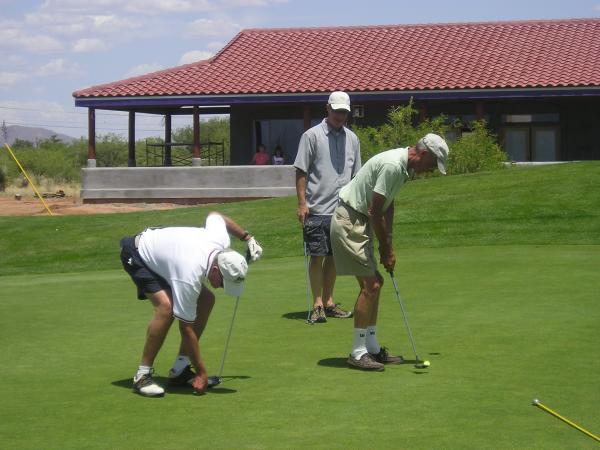 putting on 17th next to house