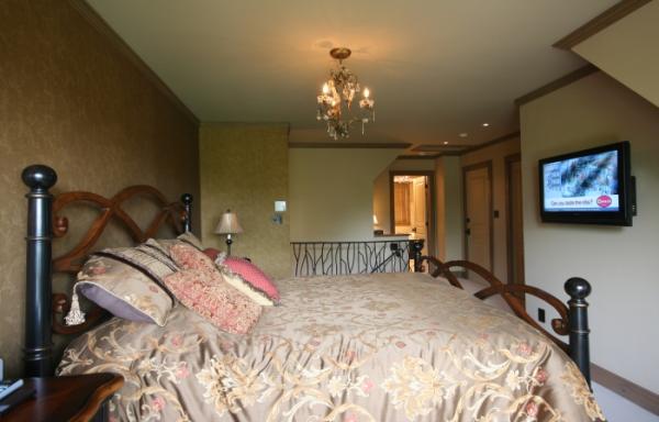 Master bedroom with King and flat screen TV
