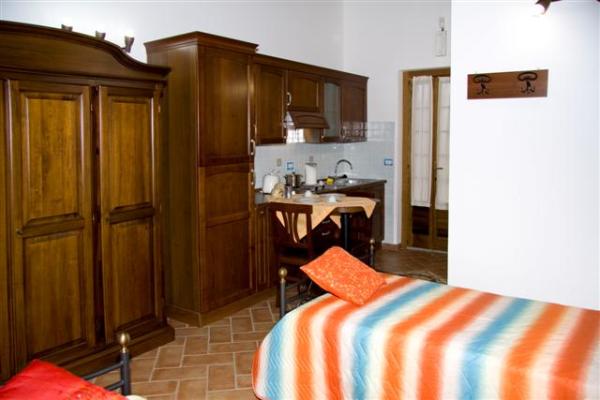 Twin Beds with Kitchen View