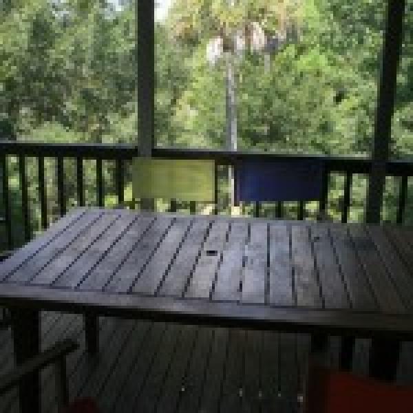 screened party and dining porch outside family roo